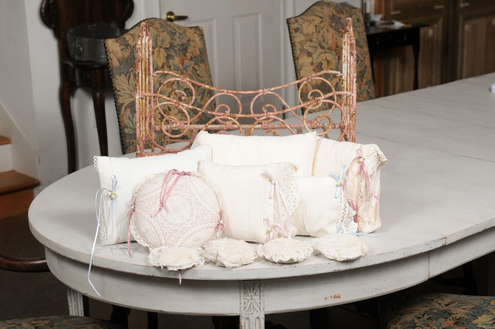 Assortment of Vintage Lace Pillows in 19th Century Metal Crib with Great Patina For Sale 5