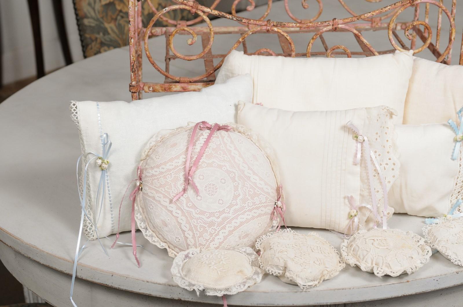 Assortment of Vintage Lace Pillows in 19th Century Metal Crib with Great Patina For Sale 8