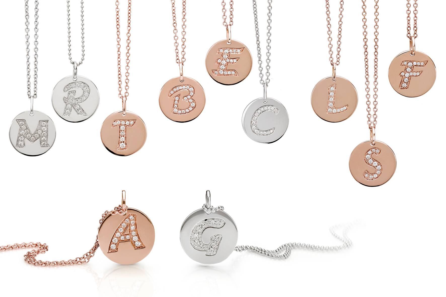 ASSYA London 's initial pendant is handcrafted from smooth 18kt yellow Gold and set with sparkling White Diamond on a fine chain. Make this personalized necklace your new style signature or give it as a unique gift. Choose the initial of your