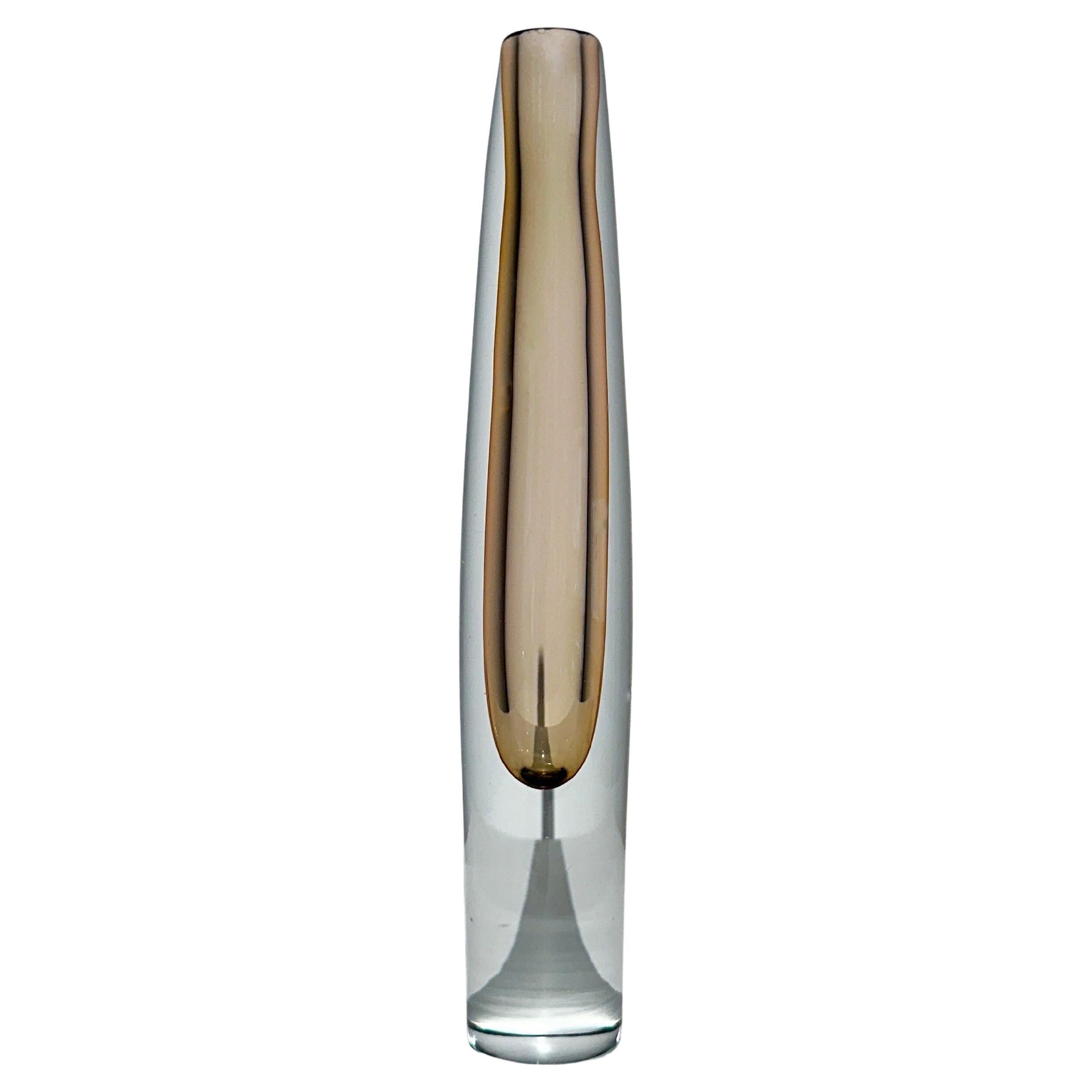 Asta Strömberg 'Sputnik' vase in crystal glass, for Strömbergshyttan glass factory in the late 1950s.

Mouth-blown and hand-shaped clear crystal with an apricot-fawn underlay.

Height: 21 cm
Diameter: 3.5 cm

Normal signs of use, small scratches