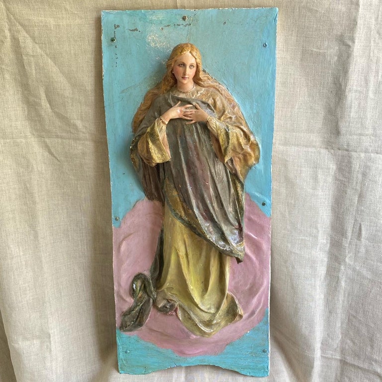 A most spectacular antique Spanish Colonial figure of Madonna, circa 19th century possibly earlier. Realistic in style, and of the highest artistic expression and craftsmanship, this Madonna is masterfully sculpted porcelain with voluminous dress,