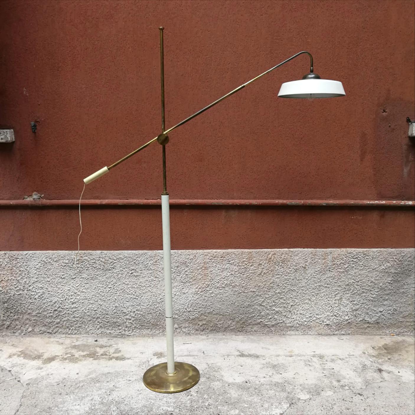 Astonishing Italian, brass and white painted metal, floor lamp from 1950s
Rare floor lamp coming from Italy approximately from fifties. Structured in brass and white painted metal, completely adjustable as you want in height, inclination and