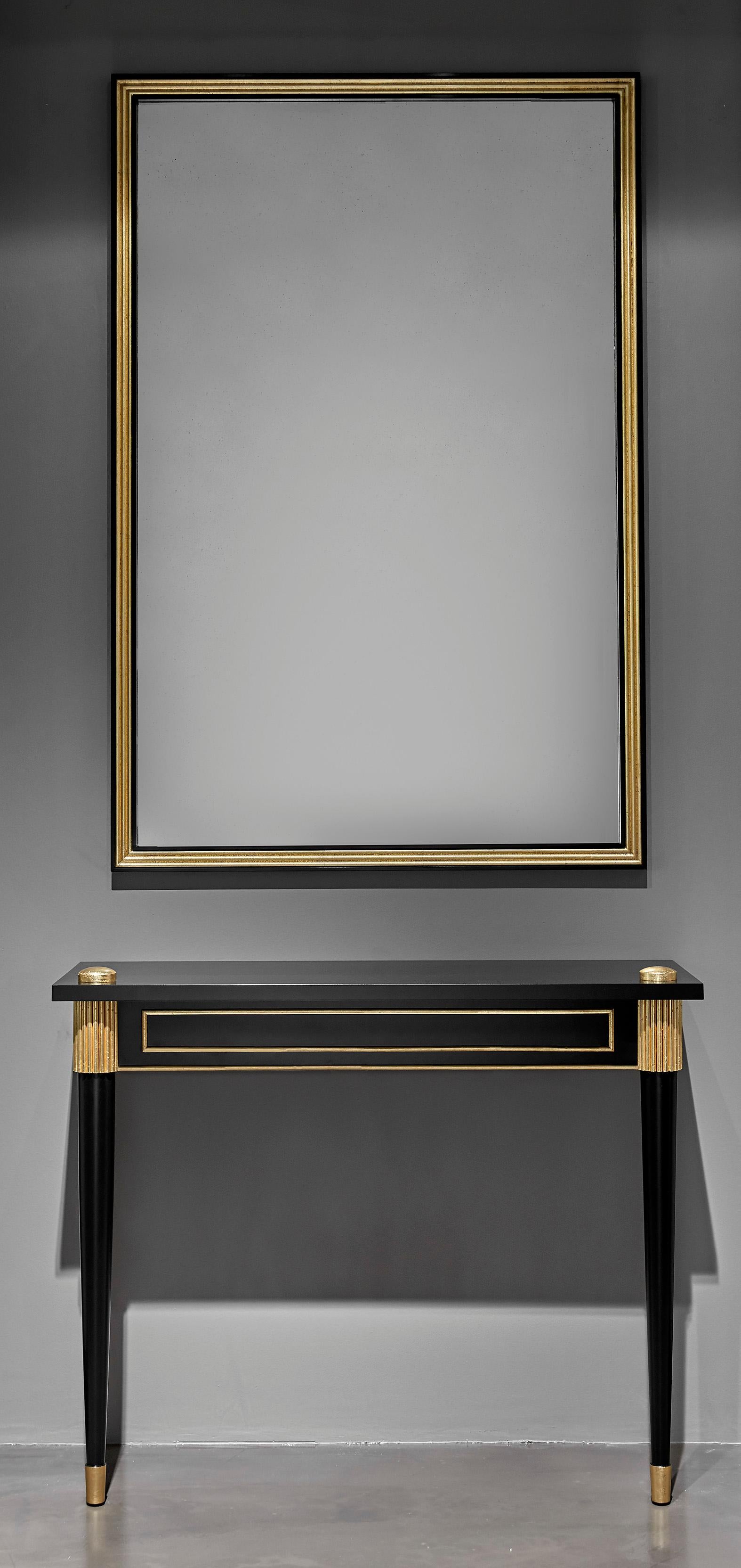 Astor console
Dimensions: 36” W. X 1.25” D. X 54” H.
Finish: Black lacquer and gold accents
Glass: Clear mirror

Designed by Eva Quateman
Handmade in Chicago by top craftsmen
Custom size/ finish prices upon request 

   