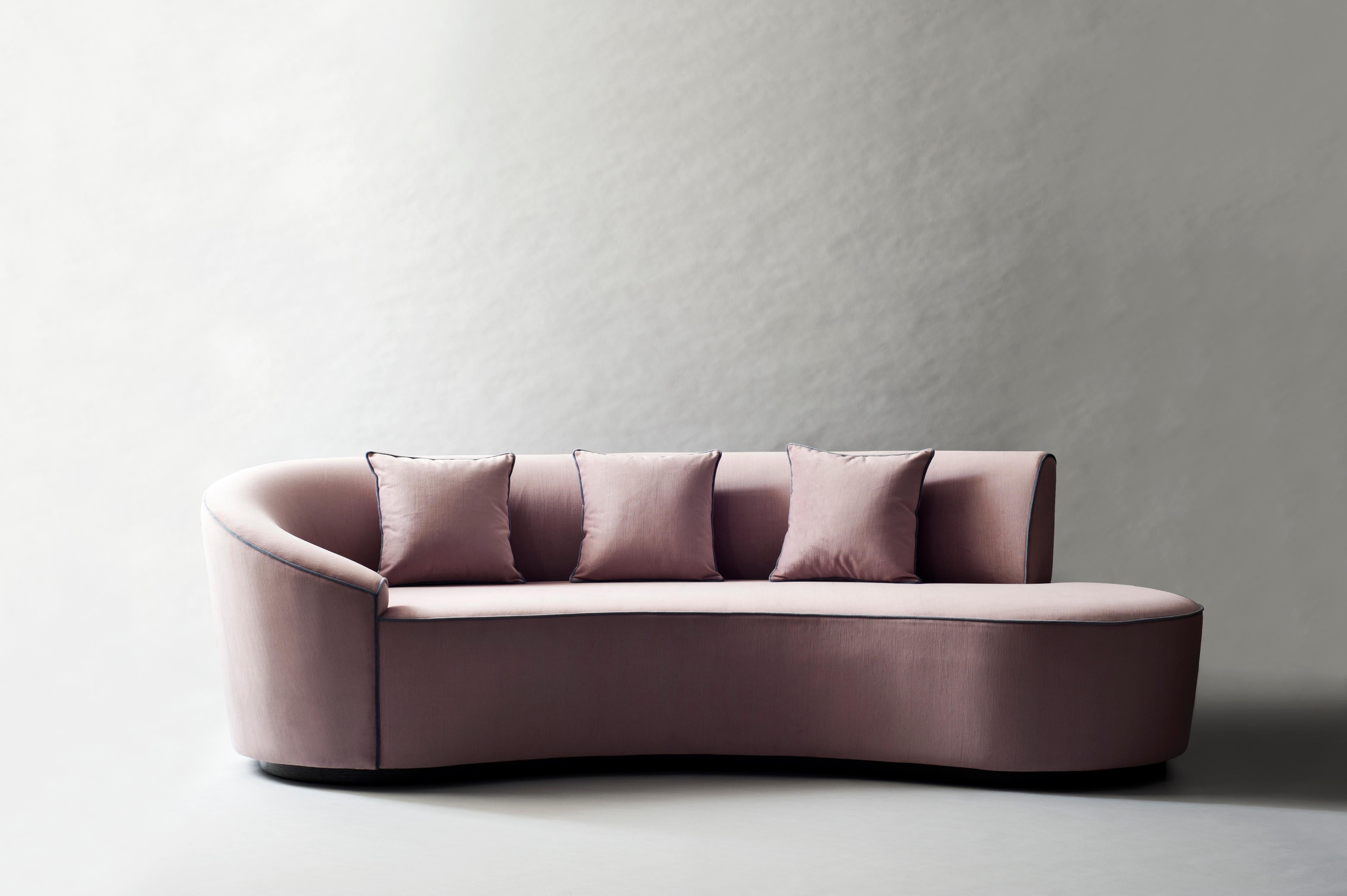 Taking inspiration from the lines of Vladimir Kagan's iconic serpentine sofa, the astra sofa by DeMuro Das features a curved back and arm and a long, sinuous seat. Solid hardwood frame with European webbing and multi-density foam make this a