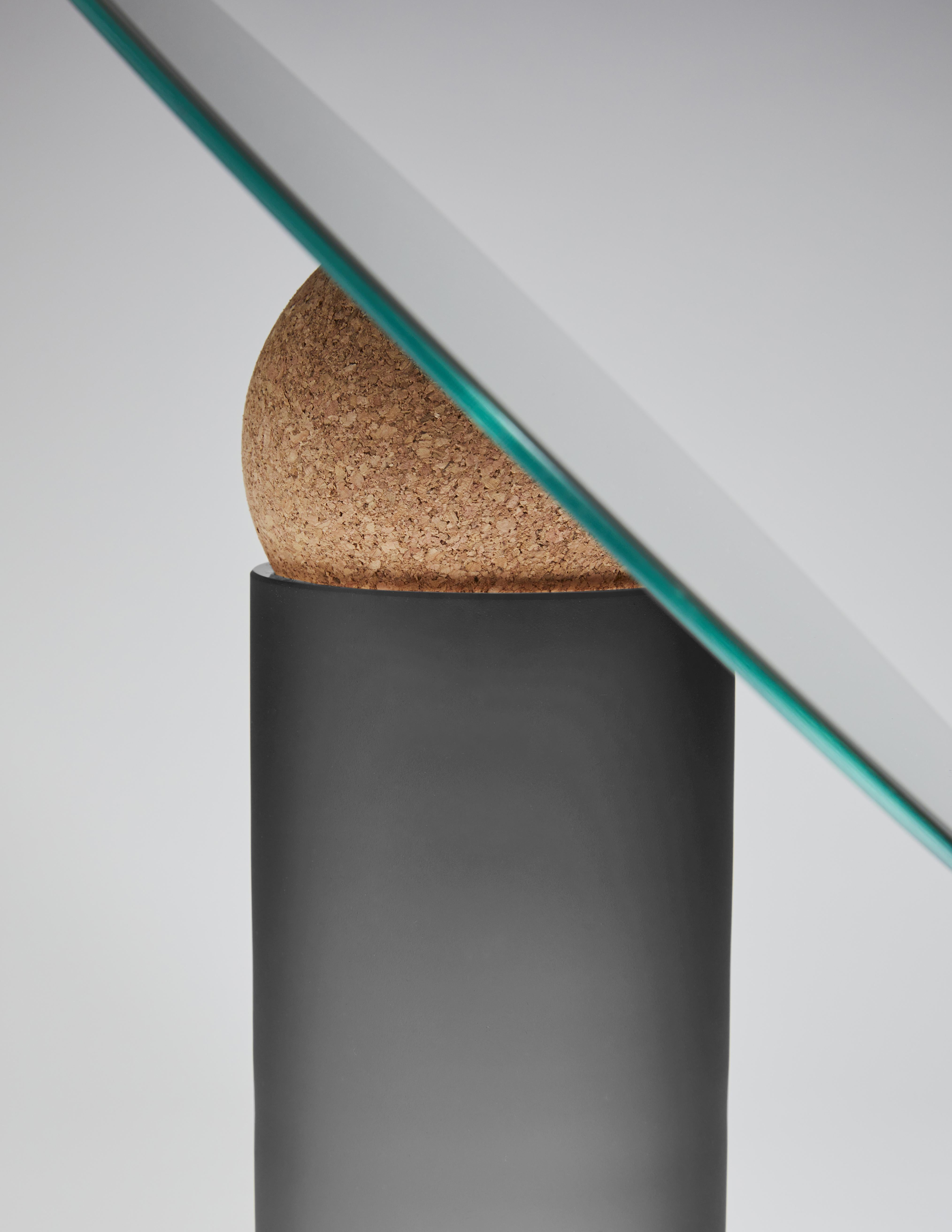 Astra table mirror-30 by Clemence Birot
Dimensions: Mirror Ø 30 x 33 cm
Materials: mirror, glass, cork. 

Clemence Birot started her career in Copenhagen, Denmark, and discovered a design practice closely related to craftsmanship. The latter