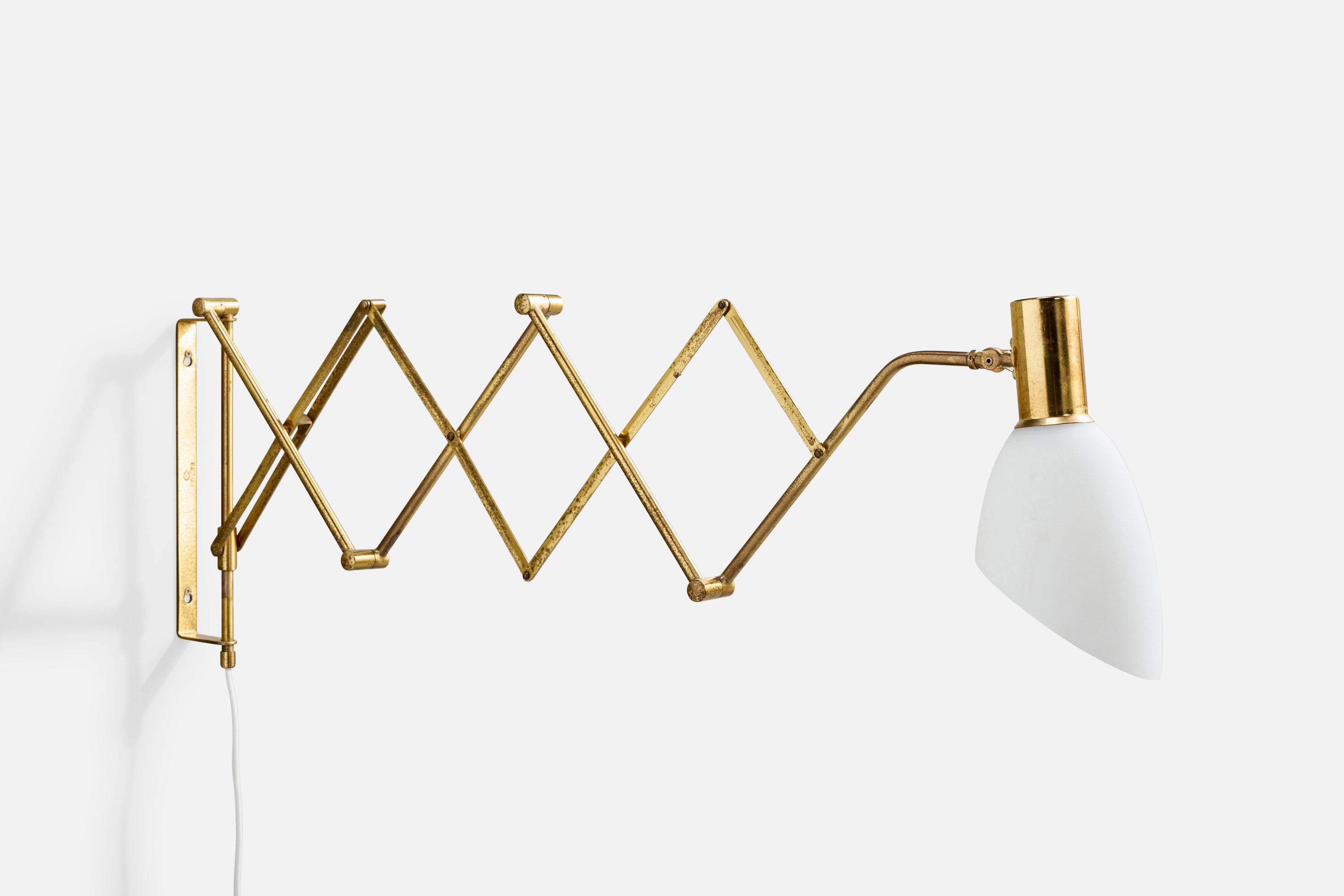 An adjustable brass and white opaline glass wall light produced by Astra, Norway, c. 1950s.

Moderate oxidation present throughout brass fixture.

Dimensions variable; measured as shown.

Overall Dimensions (Inches): 12.0