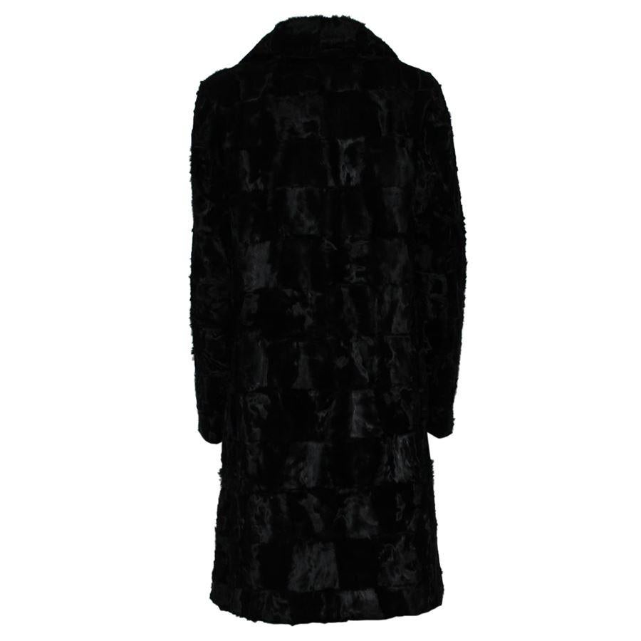Astrakhan lamb fur Black color 2 Buttons 2 Pockets Total length from shoulder cm 94 (37 inches)
