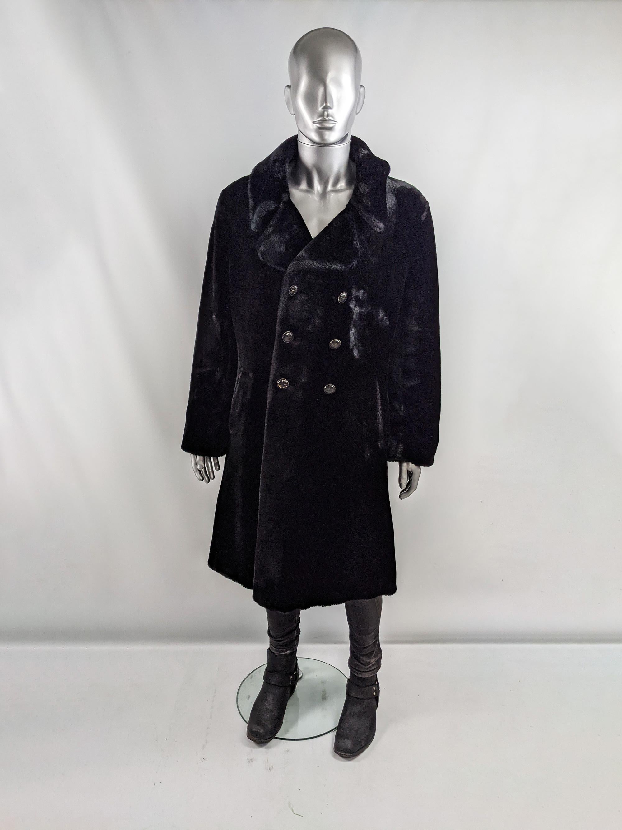 An absolutely amazing and super rare vintage gents faux fur peacoat from the 70s by British fashion label, Astraka for their menswear line, Astraman. In a soft, black fake fur, it is really hard to find original men's faux fur coats from the