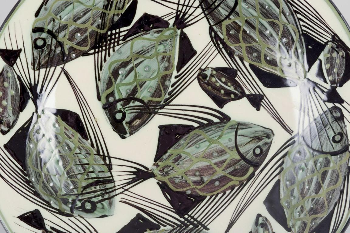 Danois Astrid Tjalk for Kähler. Large ceramic dish with a motif of fish. en vente