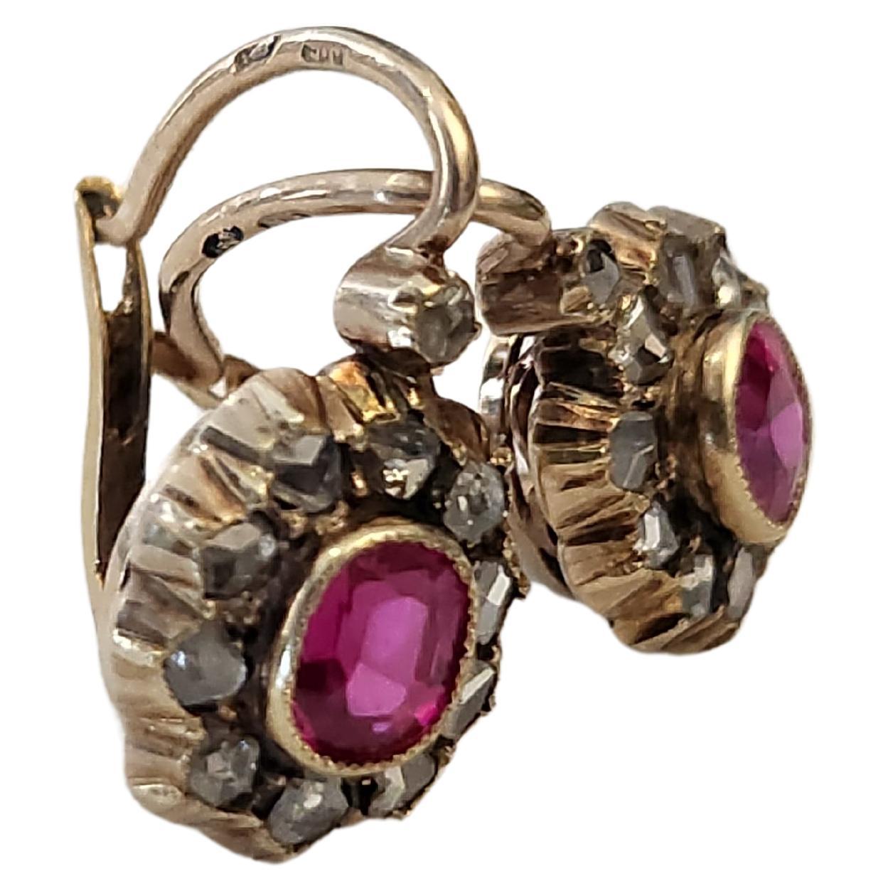 Antique 1880s Austro-Hungarian era 18k gold earrings centered with 2 natural ruby stones flanked with rose cut diamonds earrings lenght 2.5cm hall marked with dog head gold standard and letter A for vienna city assay mark and initial maker mark
