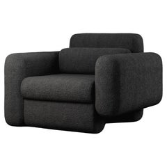 ASYM CHAIR – Moderner asymmetrischer Sektionsstuhl aus schwarzem Bouclé