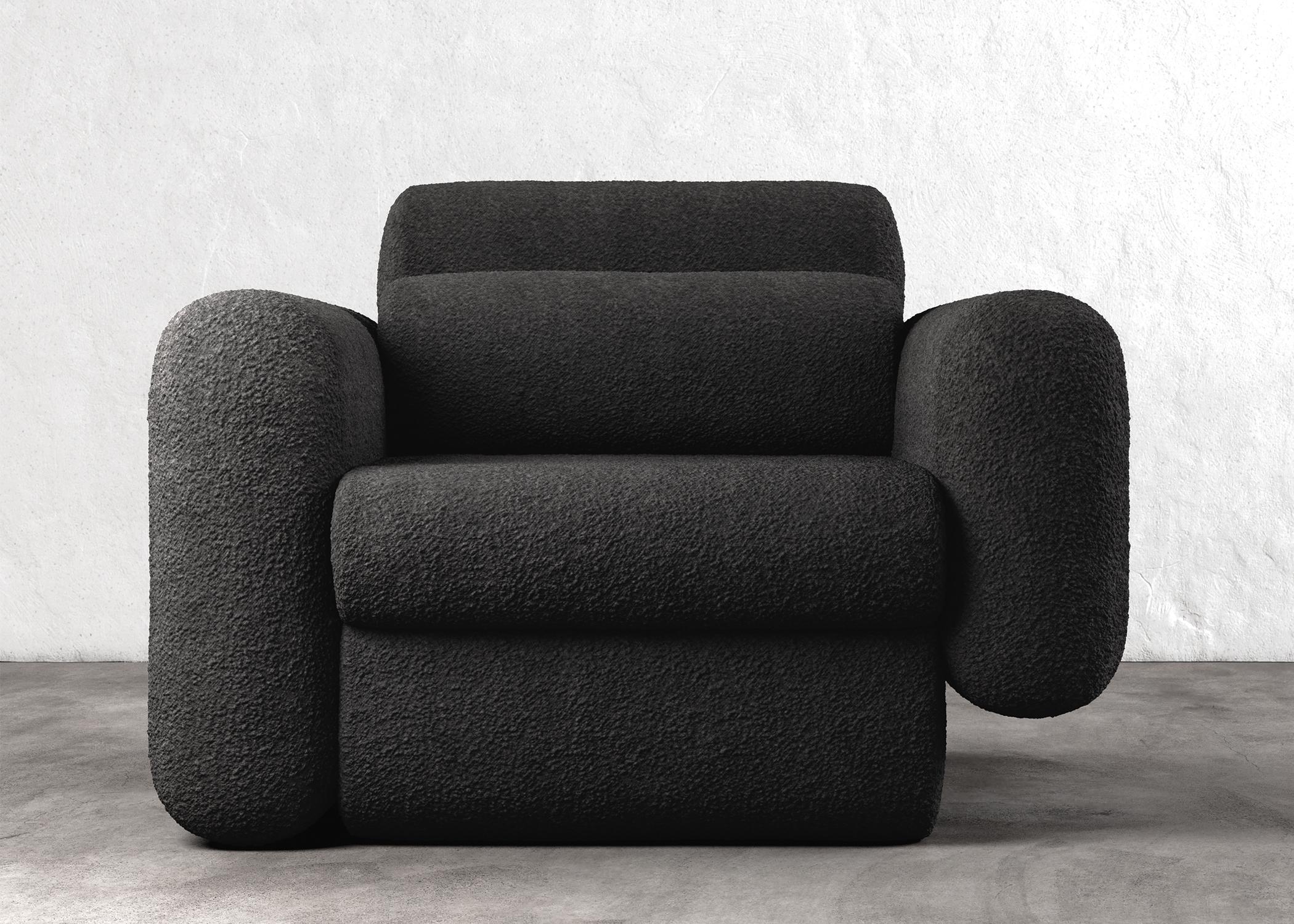 ASYM CHAIR - Modern Asymmetrical Sectional Chair in Black Boucle

The Asym chair is a stunning piece of furniture that features asymmetrical design elements that create a unique and modern aesthetic. The tension between the unbalanced elements of