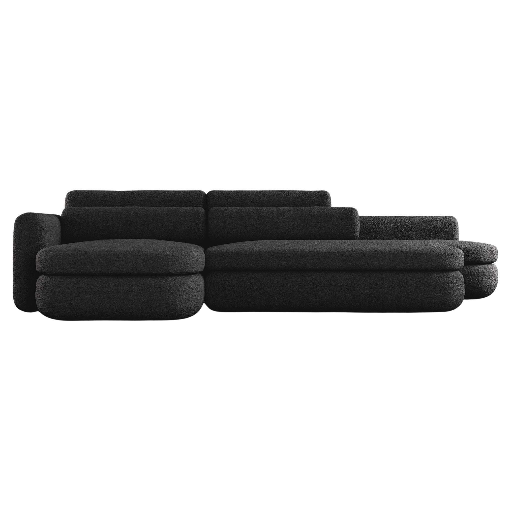 ASYM SECTIONAL – Modernes asymmetrisches Sofa aus schwarzem Bouclé