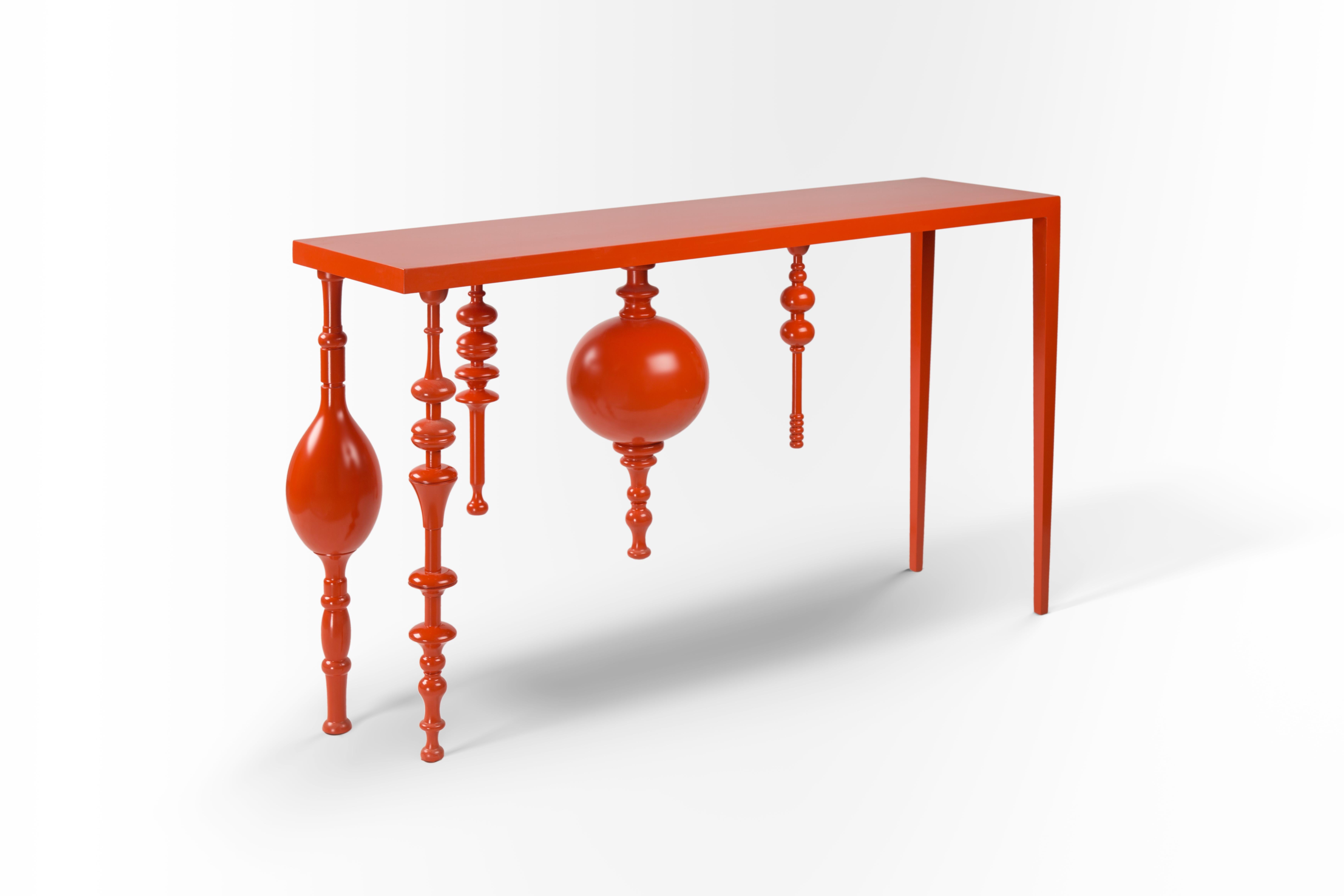 Asymmetric Arabesque, Inspired Console with Lacquered Wood in Bright Orange.
Our Modern Meets Heritage console design nods to traditional Islamic craftsmanship. Its legs are arabesque-inspired and beautifully grooved to reflect our heritage, and