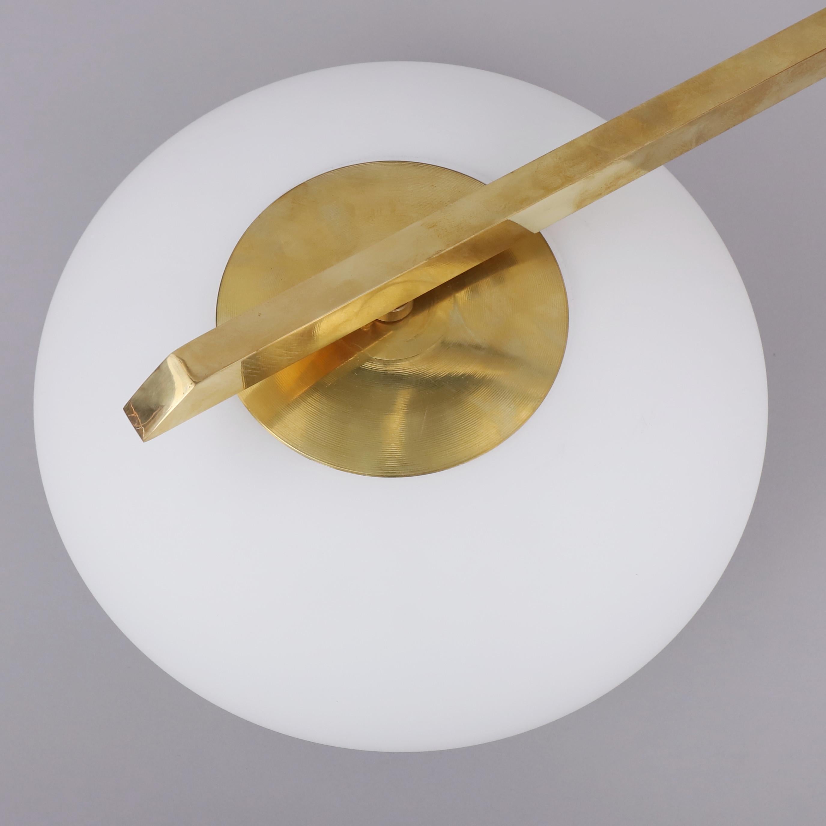 Ceiling light wall light in the style of Angelo Lelli For Arredoluce a recent edition made in Italy circa 1990/2000. No signature 
This asymmetric model can be use as a ceiling lamp or a wall light.
Made of brass and 2 opalin white glass to hide