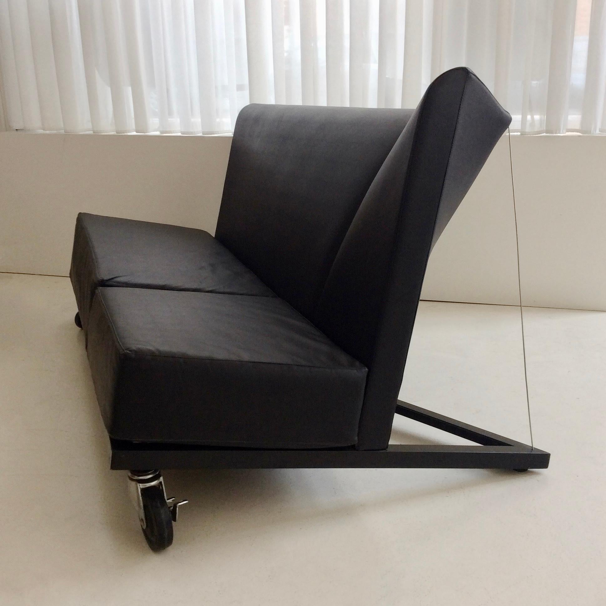 Nice Asymmetric sofa by Paollo Pallucco et Mireille Rivier by Palucco, circa 1980.
Black leather and metal frame.
Dimensions: 165 cm W, 100 cm D, 95 cm H.
Good original condition.
All purchases are covered by our Buyer Protection Guarantee.
This