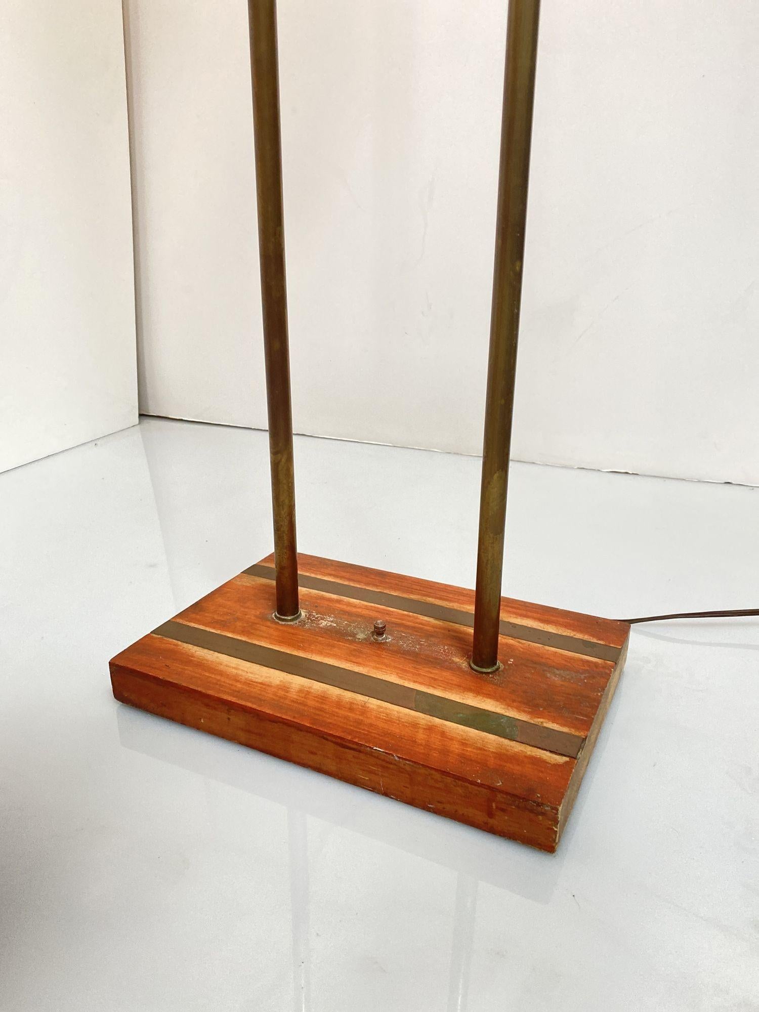 Asymmetric Mid-century Brass torchiere floor Lamp w/ wood base and smoked swirl glass shades
 