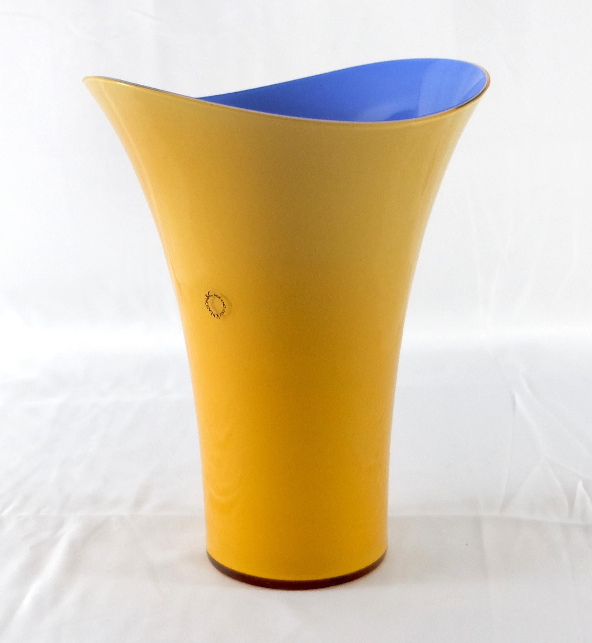 Offered for sale is a yellow & blue Asymmetric Murano Glass vase by V. Nason & C. of Italy. The vase is marked at the base and retains the original label. Vincenzo Nason established his glassworks, Vincenzo Nason & Cie (VNC) on the island of Murano,
