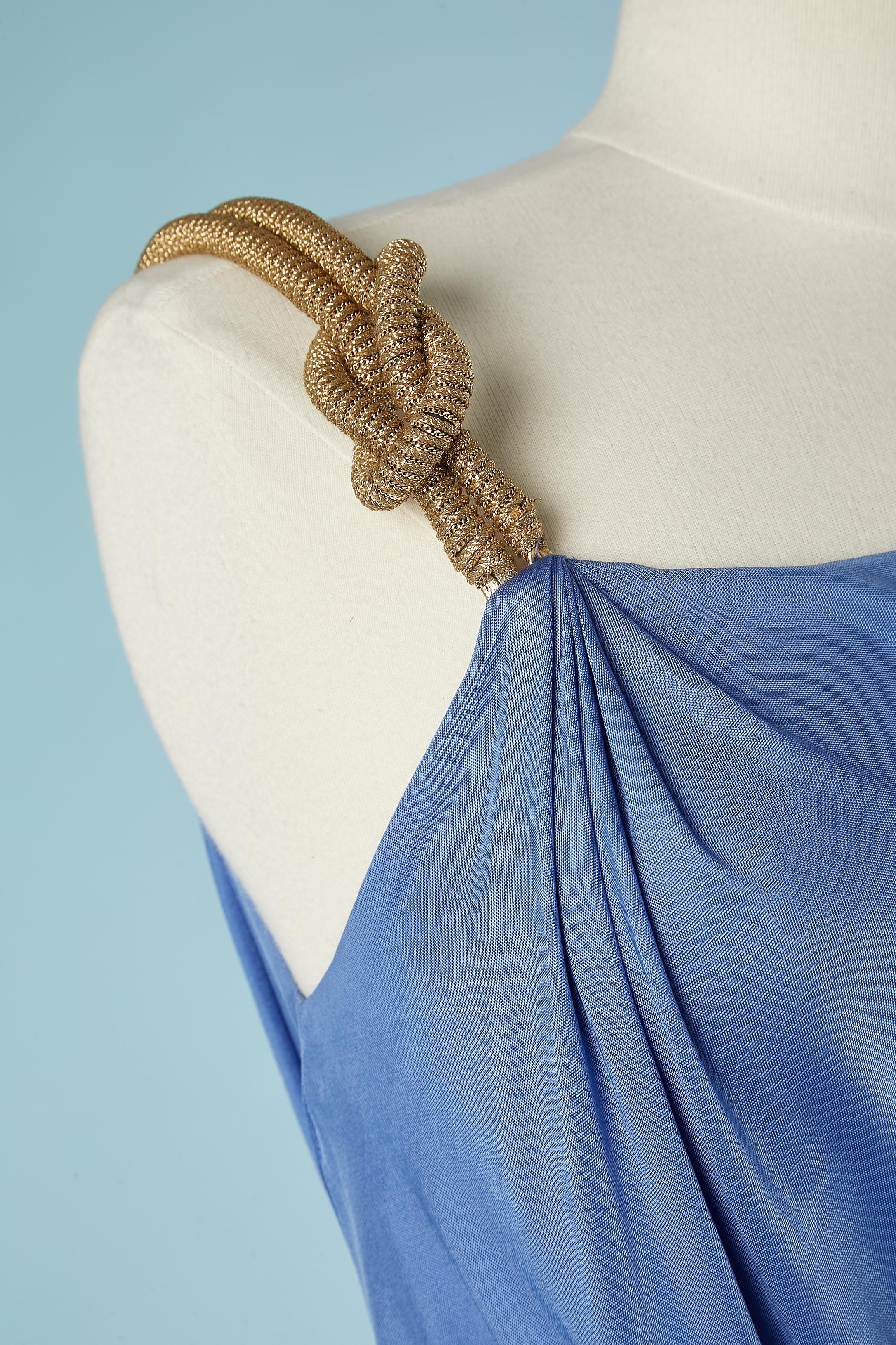 Asymmetrical blue drape rayon dress with gold shoulder strap passementerie.
Split on the right side = 60 cm 
Fabric: 100% rayon.
SIZE :42 (It) 38 (Fr) M