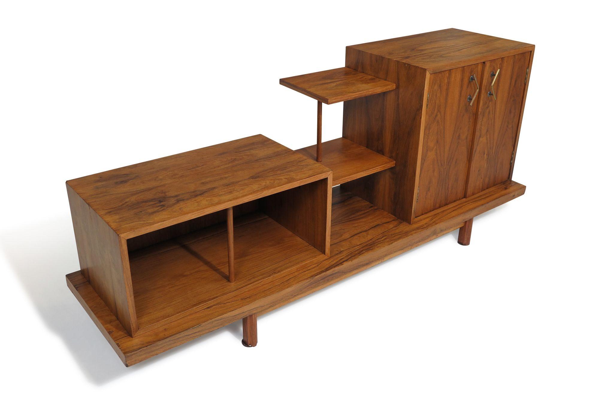 Asymmetrical Brazilian Modern cabinet attributed to Giuseppe Scapinelli, Brazil, 1963. The unique piece of Brazilian furniture is handcrafted of Caviuna wood and composed of different compartments divided by shelves in different levels. The bar