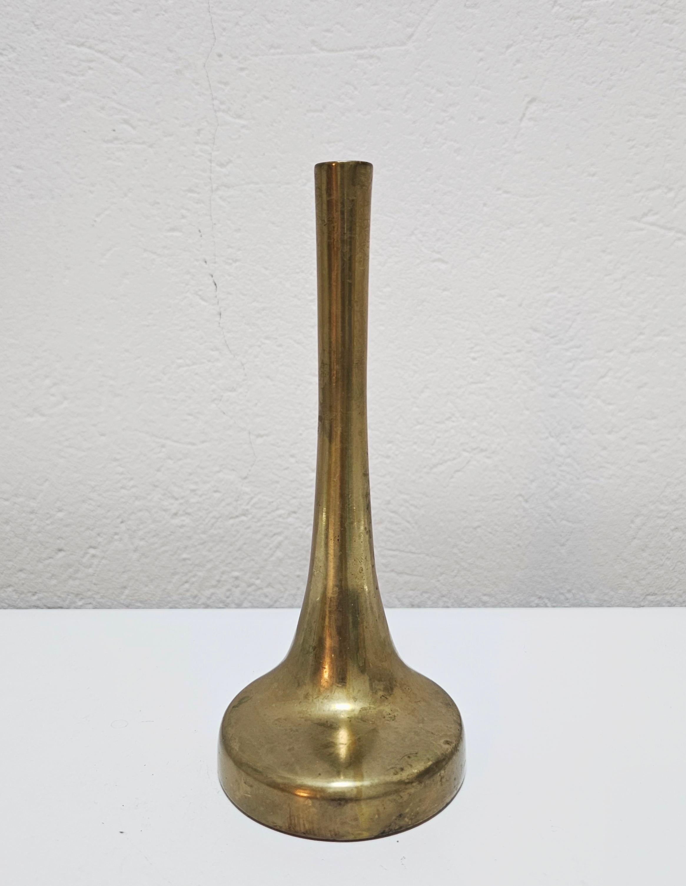 In this listing you will find a very rare and absolutely extraordinary sculptural asymmetrical Brutalist vase done in bronze, for a single flower. It was designed by Austrian designer Heinz Goll, who's work is often found at auctions in some of the