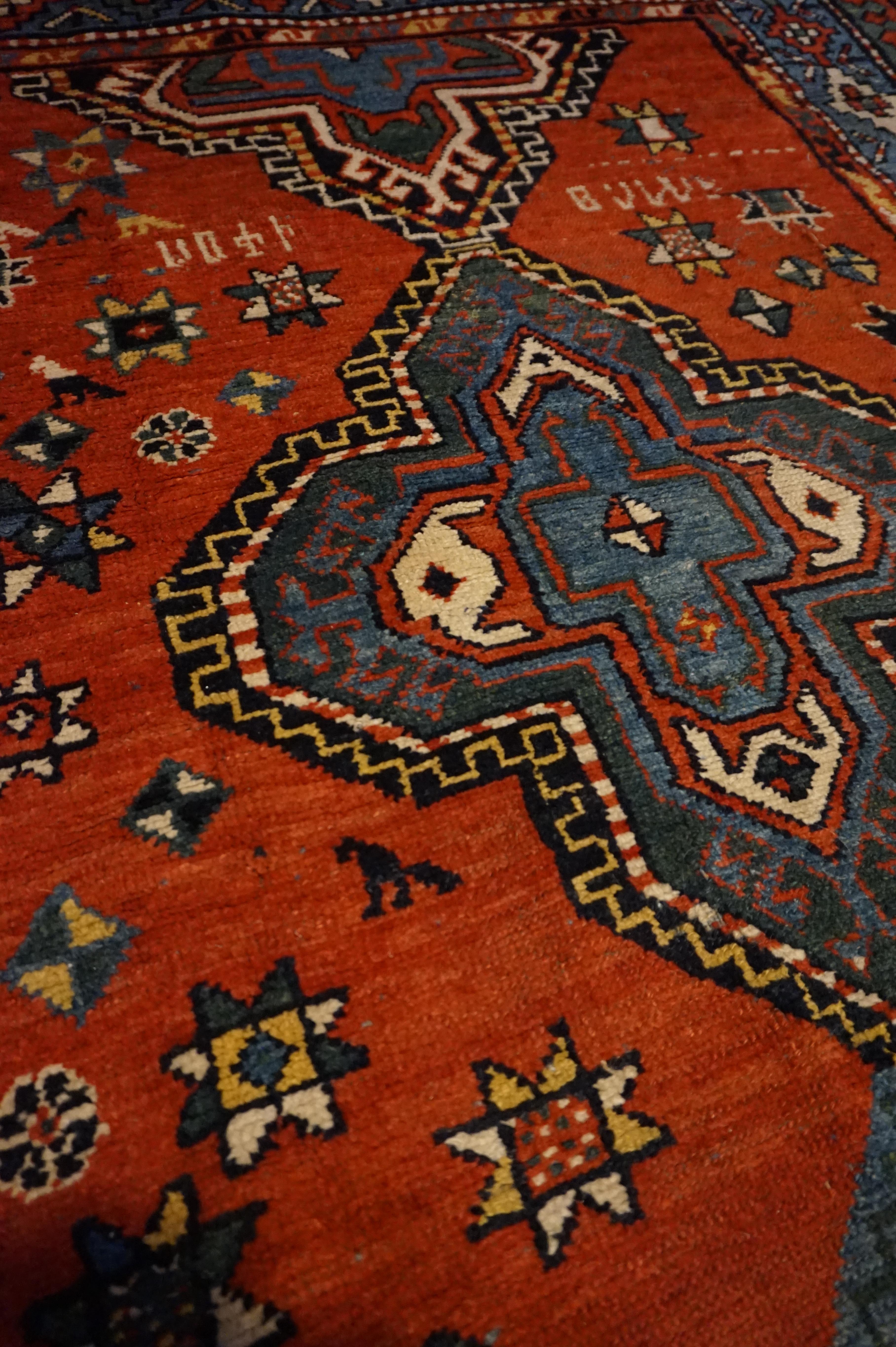 Wool Asymmetrical Caucasus Tribal Village Rug with Kite Medallions & Star Motif For Sale