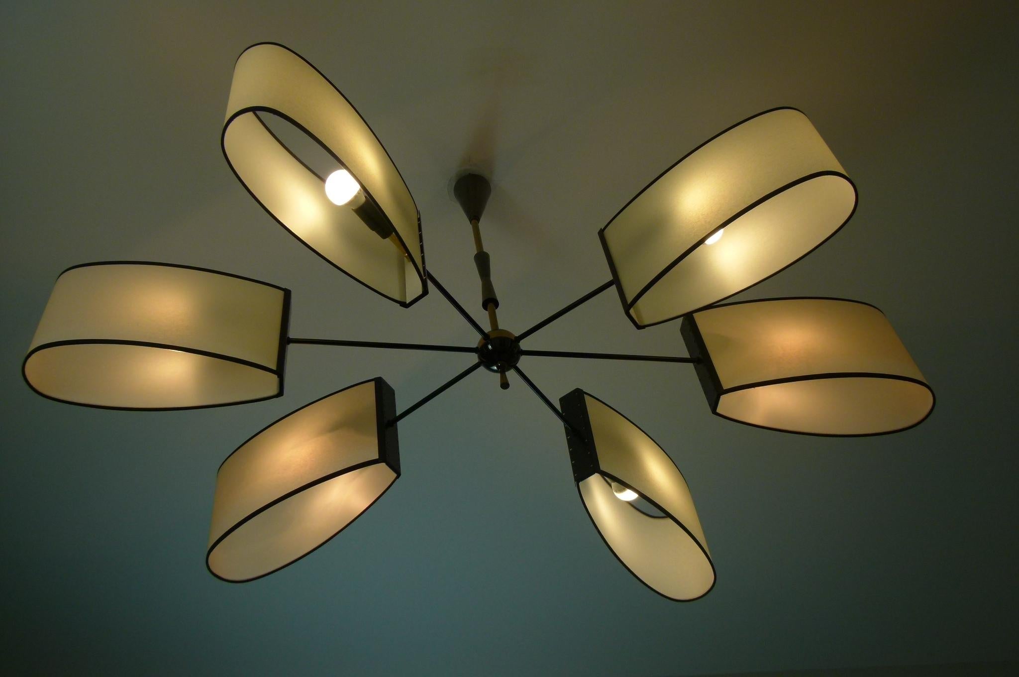 Asymmetrical chandelier with six lighted arms by Maison Lunel, circa 1950 10