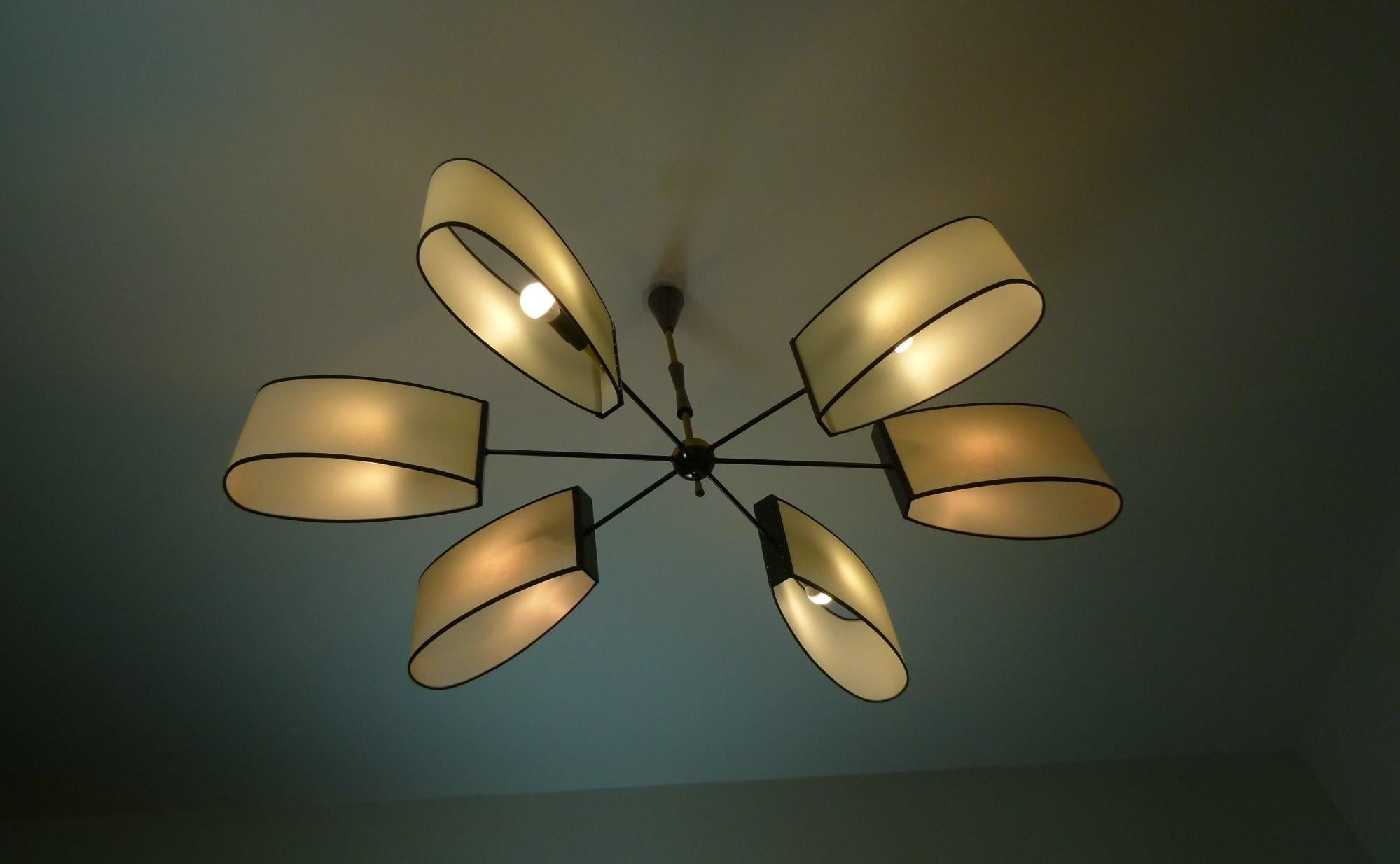 Mid-Century Modern Asymmetrical chandelier with six lighted arms by Maison Lunel, circa 1950