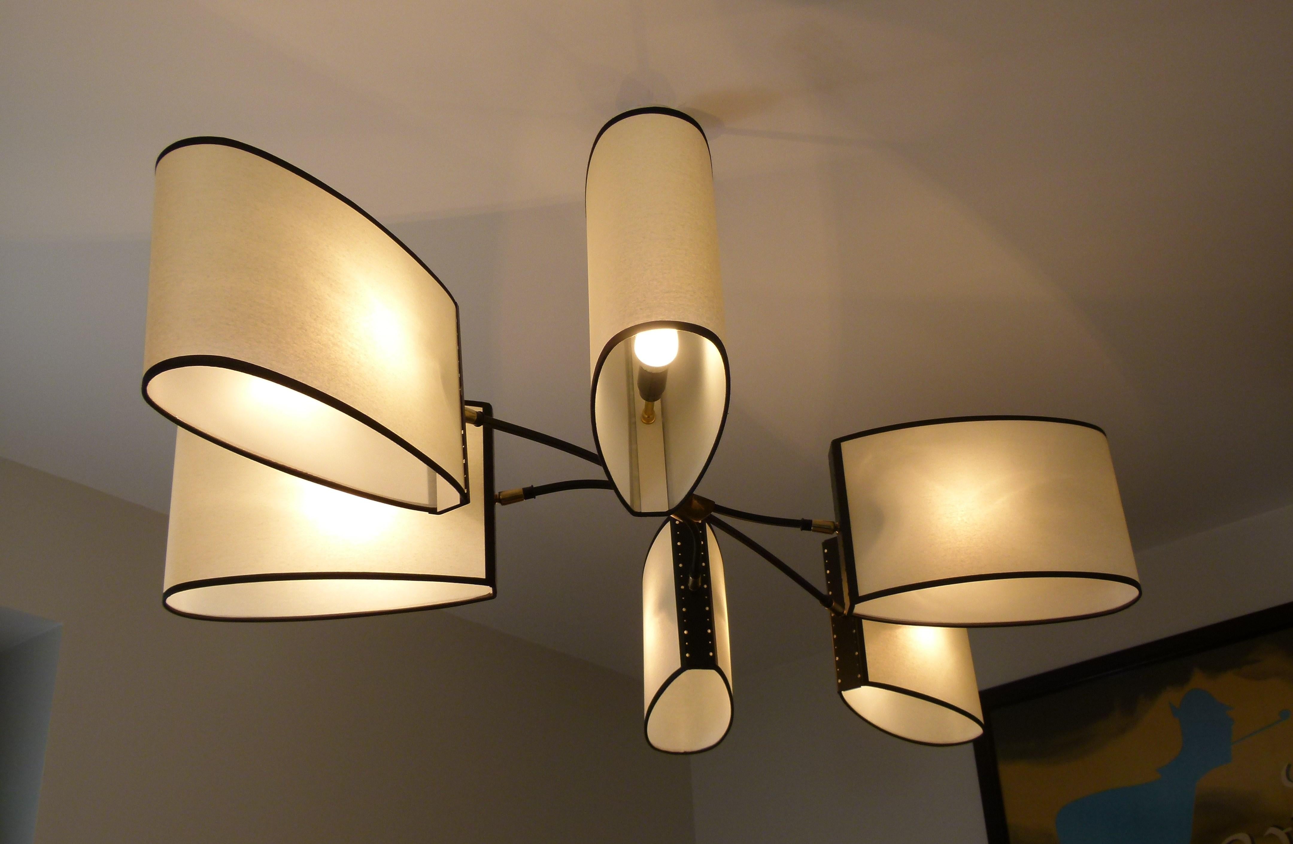 French Asymmetrical chandelier with six lighted arms by Maison Lunel, circa 1950