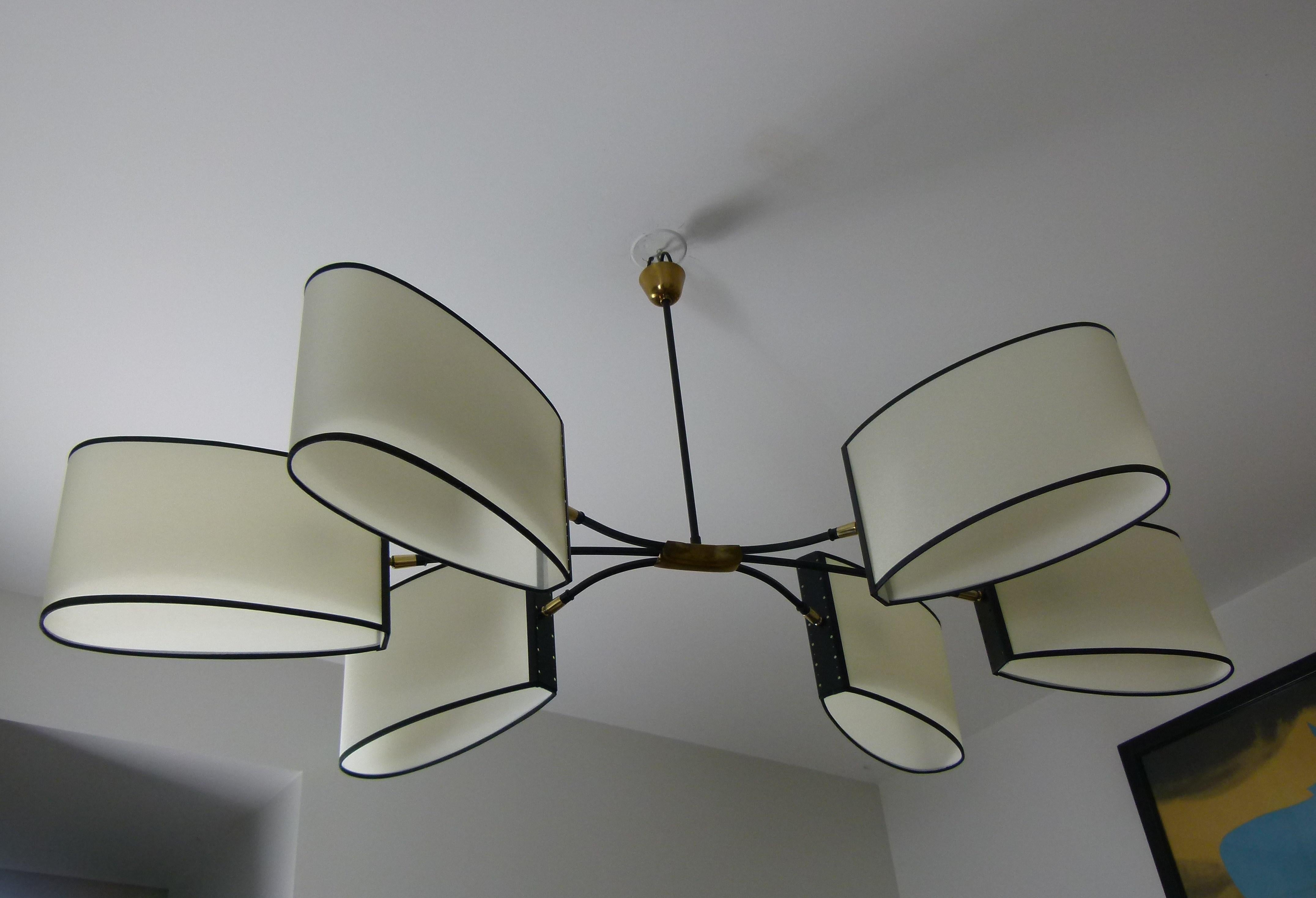 Metal Asymmetrical chandelier with six lighted arms by Maison Lunel, circa 1950