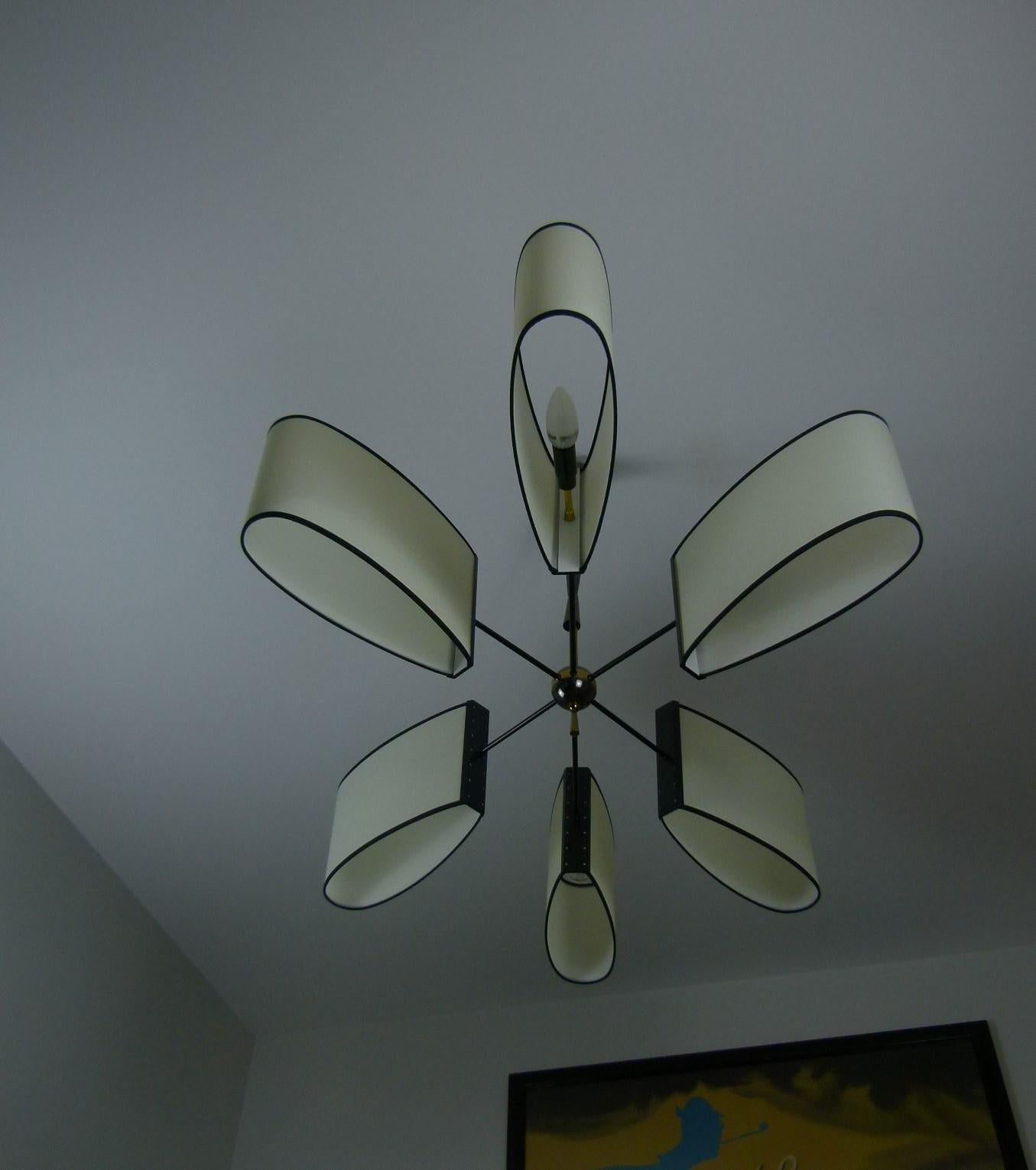 Brass Asymmetrical chandelier with six lighted arms by Maison Lunel, circa 1950