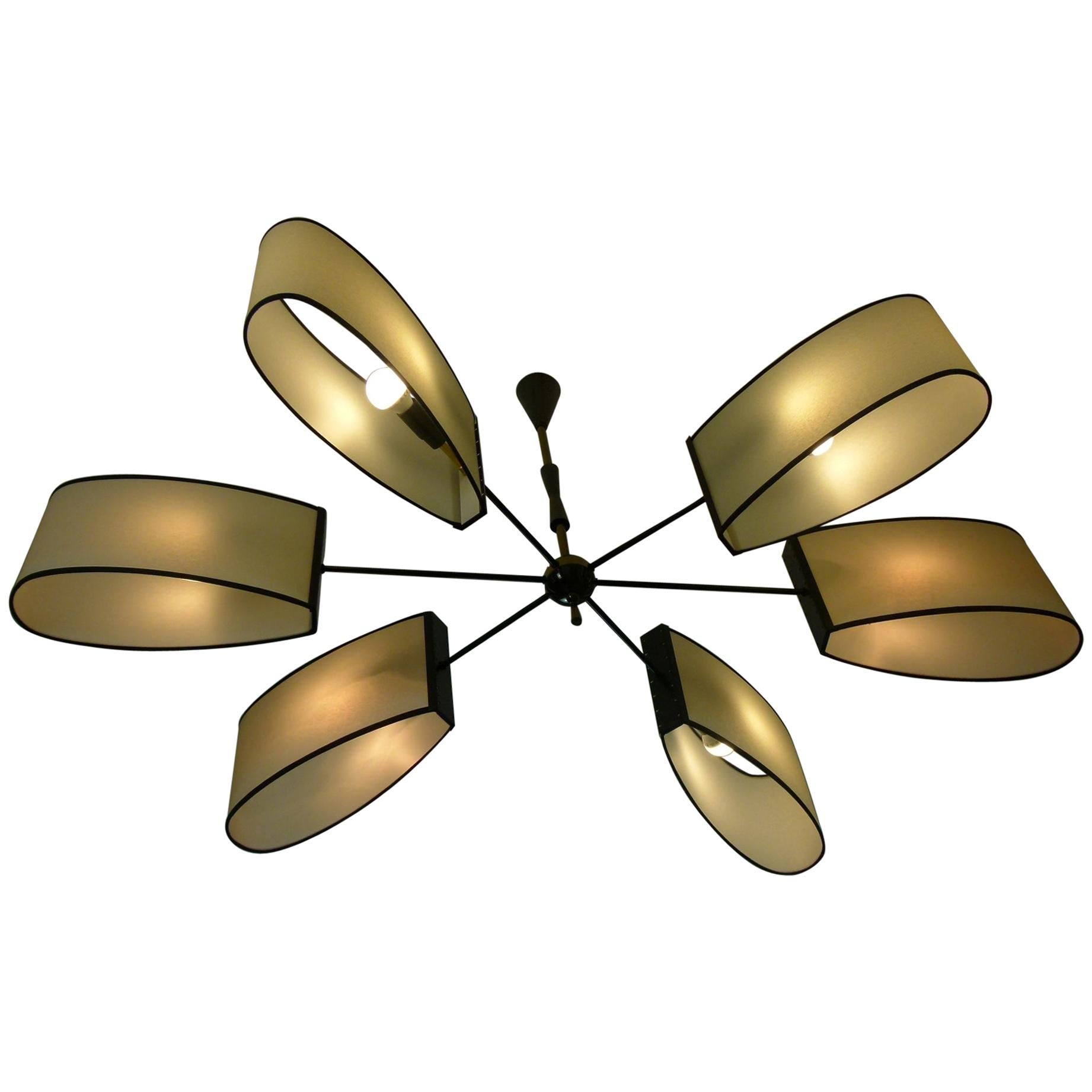 Asymmetrical chandelier with six lighted arms by Maison Lunel, circa 1950