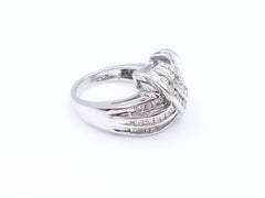 Asymmetrical Channel Set Baguette and Round Diamond Ring
