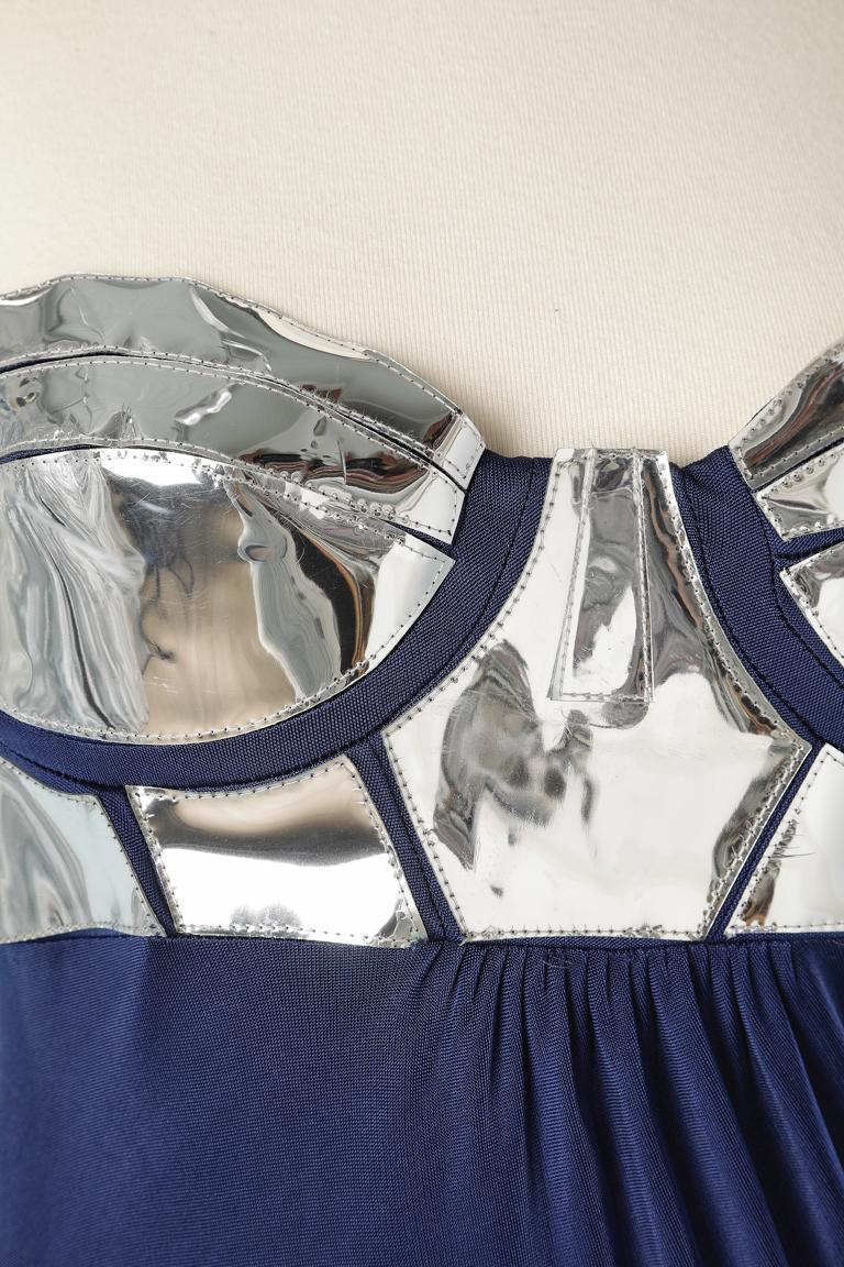 Asymmetrical cocktail dress in navy blue jersey and silver PVC bra. Jersey : 100% rayon. Silver PVC: 97% polycarbamide, 3% polyester. 
Size 42(IT) 38 (Fr) 8(US)