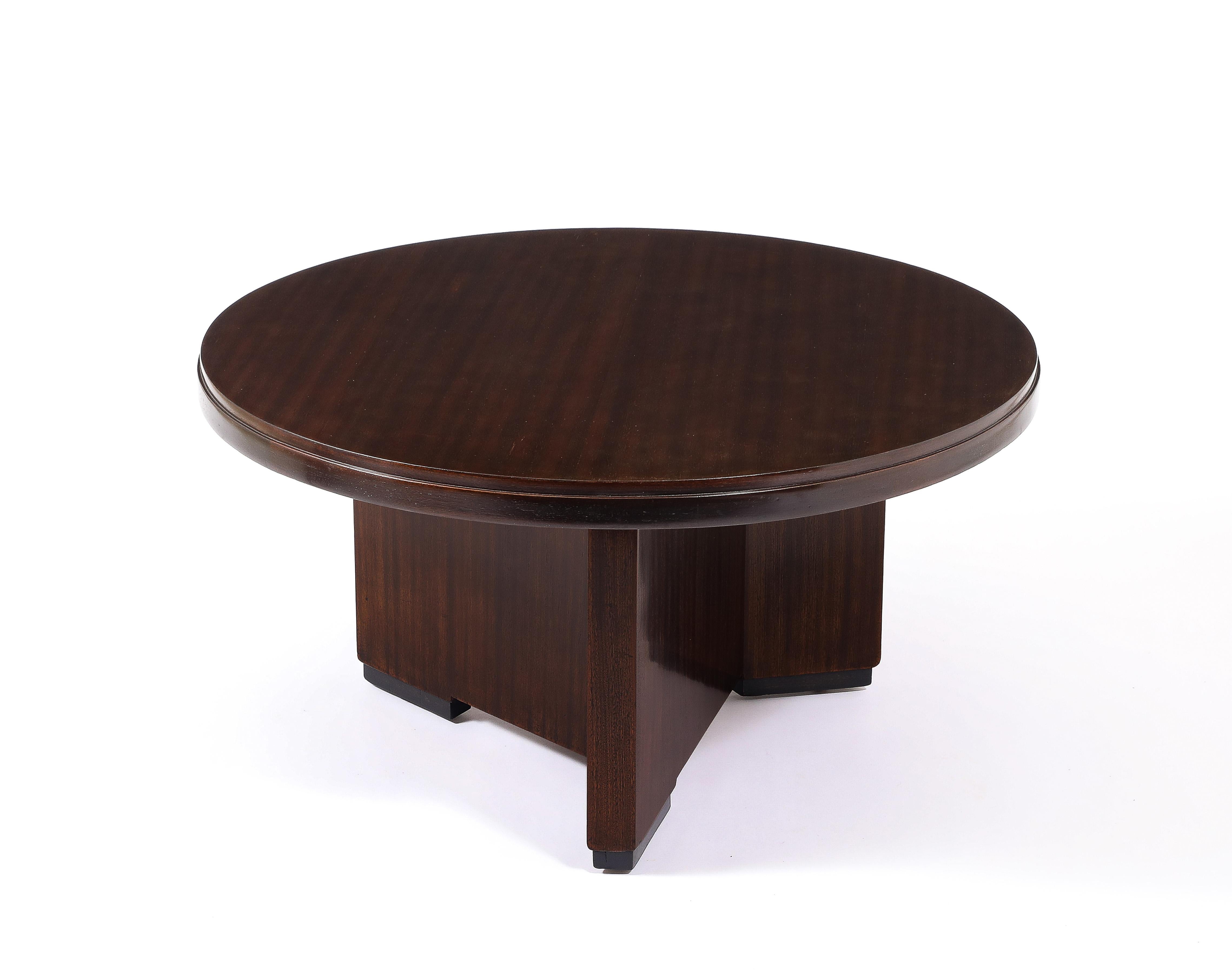 Dark Walnut tiered top table with an asymmetrical trilobbed base