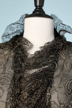 Asymmetrical evening jacket in black and gold lace 1930