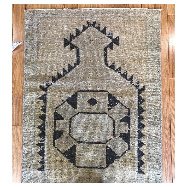 Vintage Turkish runner, asymmetrical coloring and pattern.

5’2″ x 2’10”

16035