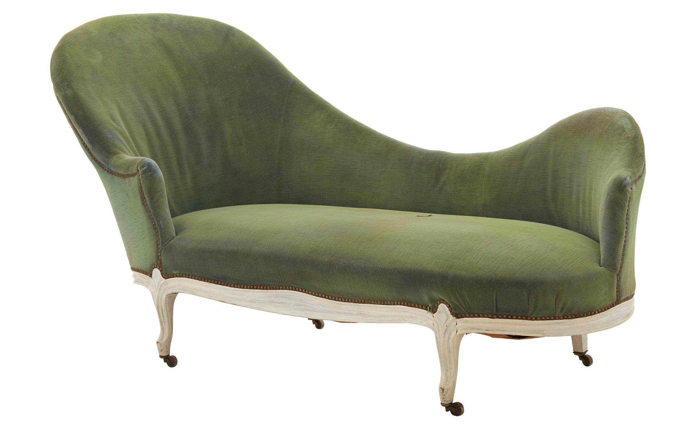 • Velvet upholstery and white painted base as found
• Antique brass nailhead trim and casters
• Early 20th century
• France.

Dimensions:
• Measures 72.5