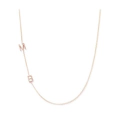 Halskette aus 14 Karat Gelbgold mit asymmetrischem Initial M B