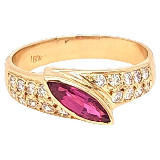 Asymmetrical marquise ruby and diamond ring