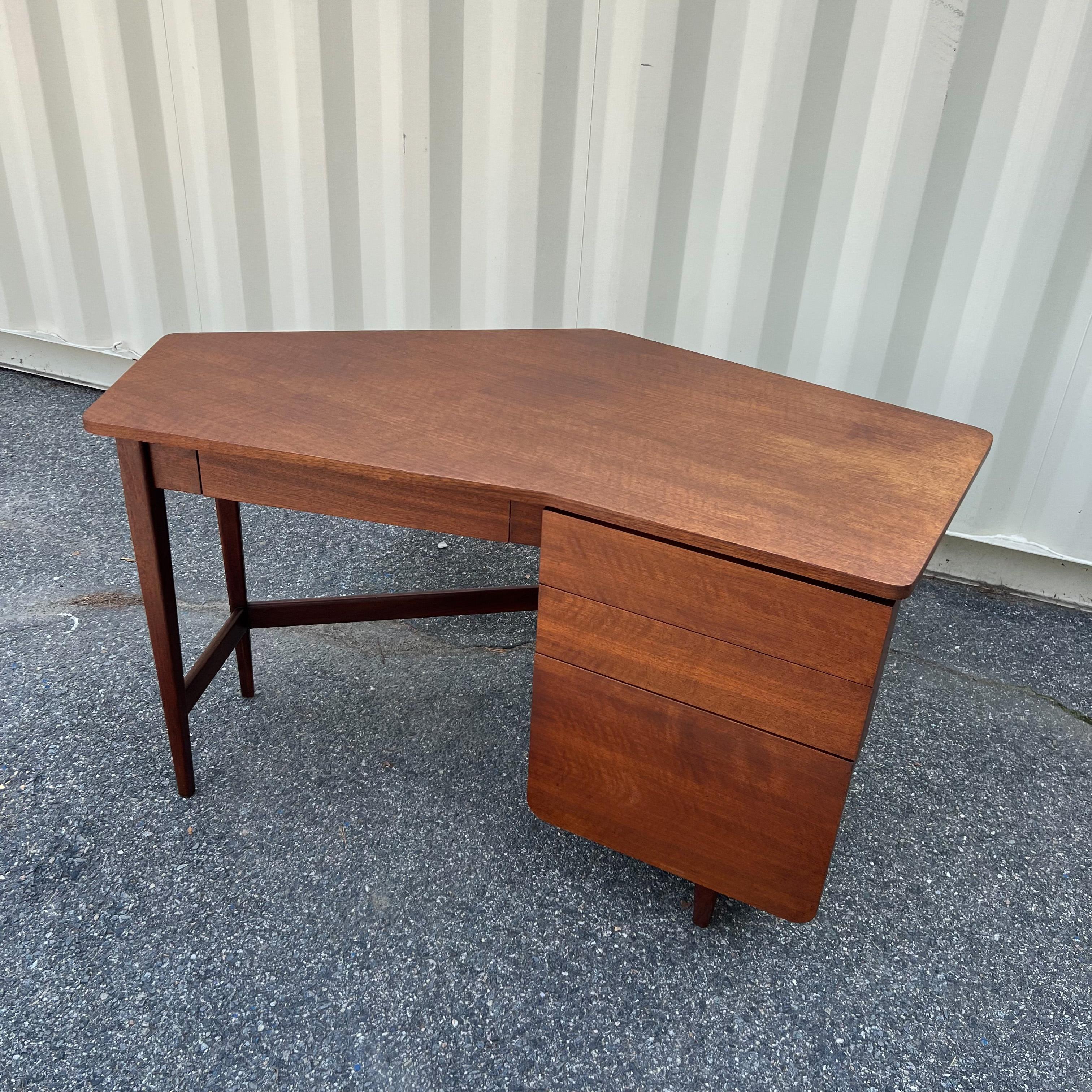 A rare angled desk designed by Bertha Schaefer in collaboration with Gio Ponti for Singer and Sons.