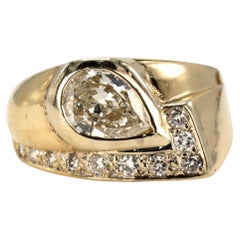 Asymmetrical Midcentury Retro Ring with Pear Shaped Diamond
