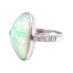 Asymmetrical Opal Ring in 18K White Gold with Halfway Pavé Diamond Band Asymmetrical Opal Ring in 18K White Gold with Halfway Pavé Diamond Band
