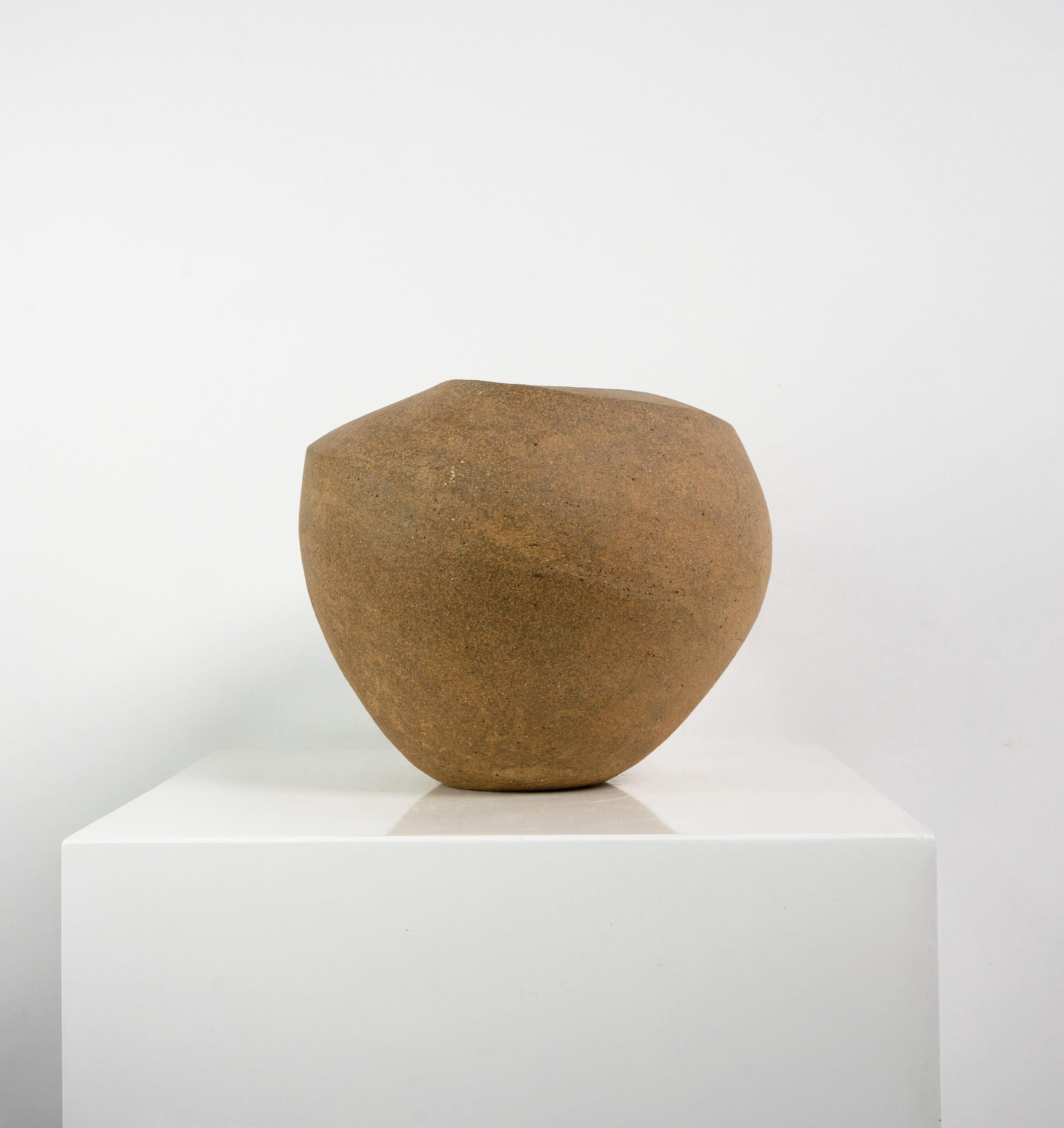 A late 20th Century, asymmetrical ovoid stoneware vessel. 

Dimensions (cm, approx):
Height: 23
Width: 27
Depth: 26.