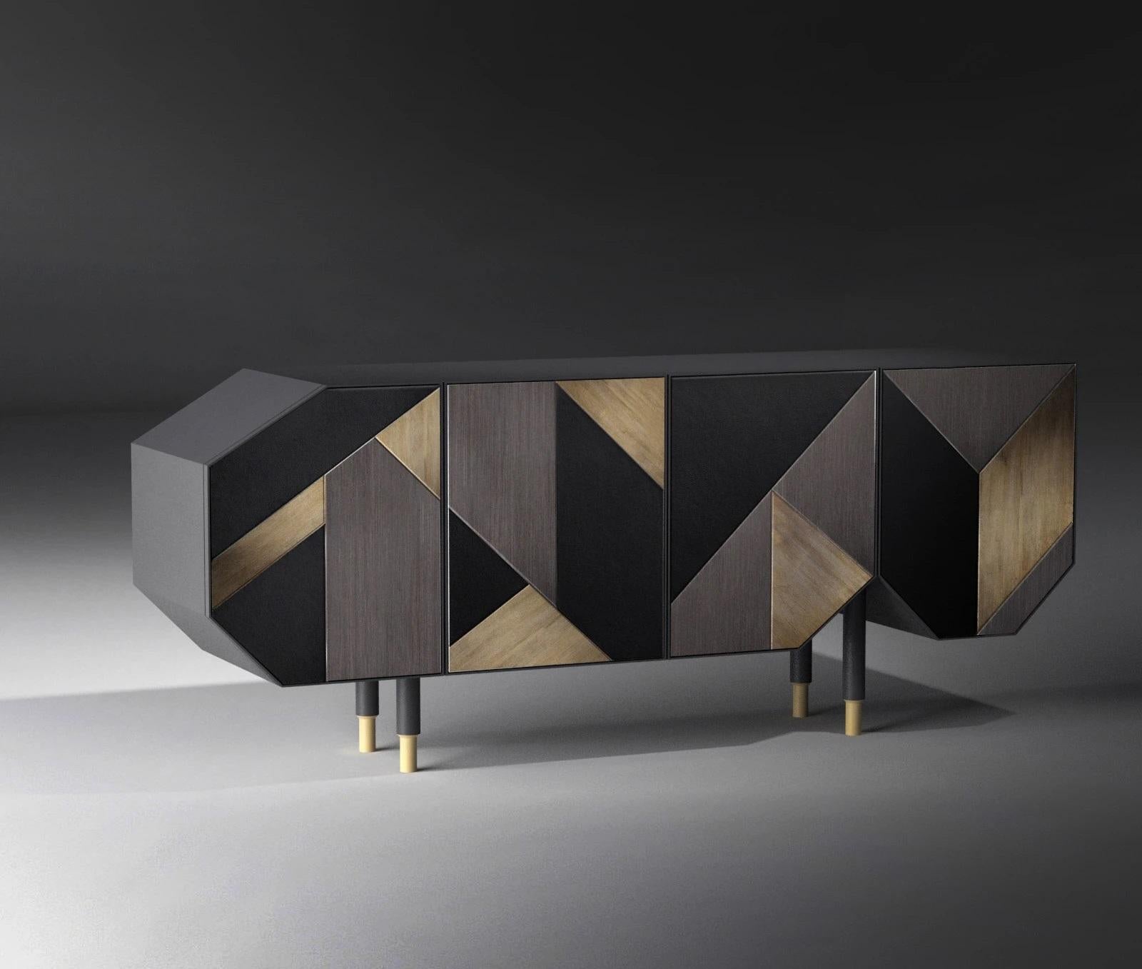Sideboard constructed with 4 doors in different sizes and shapes as pictured. 
irregular geometric pattern
The doors are inlaid with a mixture of leather, wood and brushed bronze silver leaf in irregular geometric pattern

The legs of this cocktail