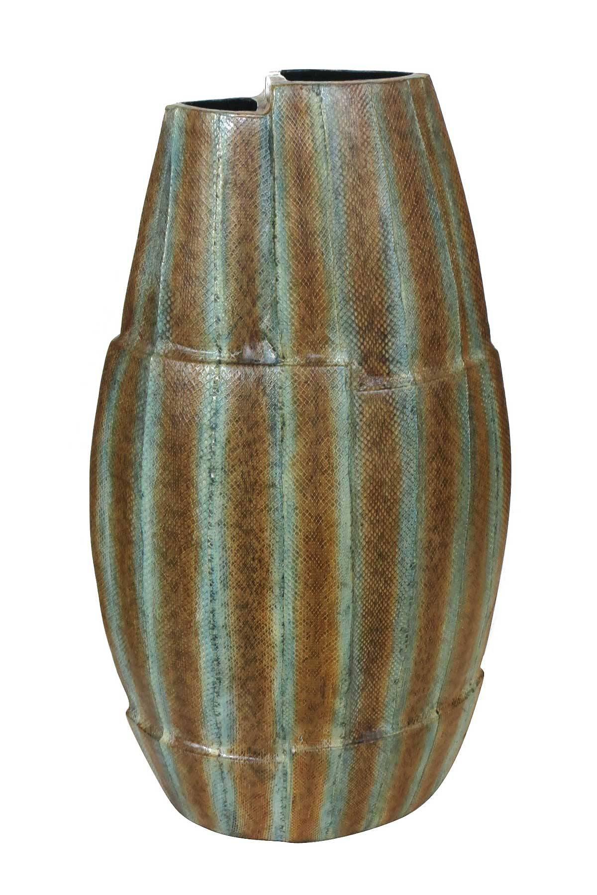 Asymmetrical resin vase wrapped in a multicolored dyed snakeskin. The vase features a stepped two split level top and unique oval shape.