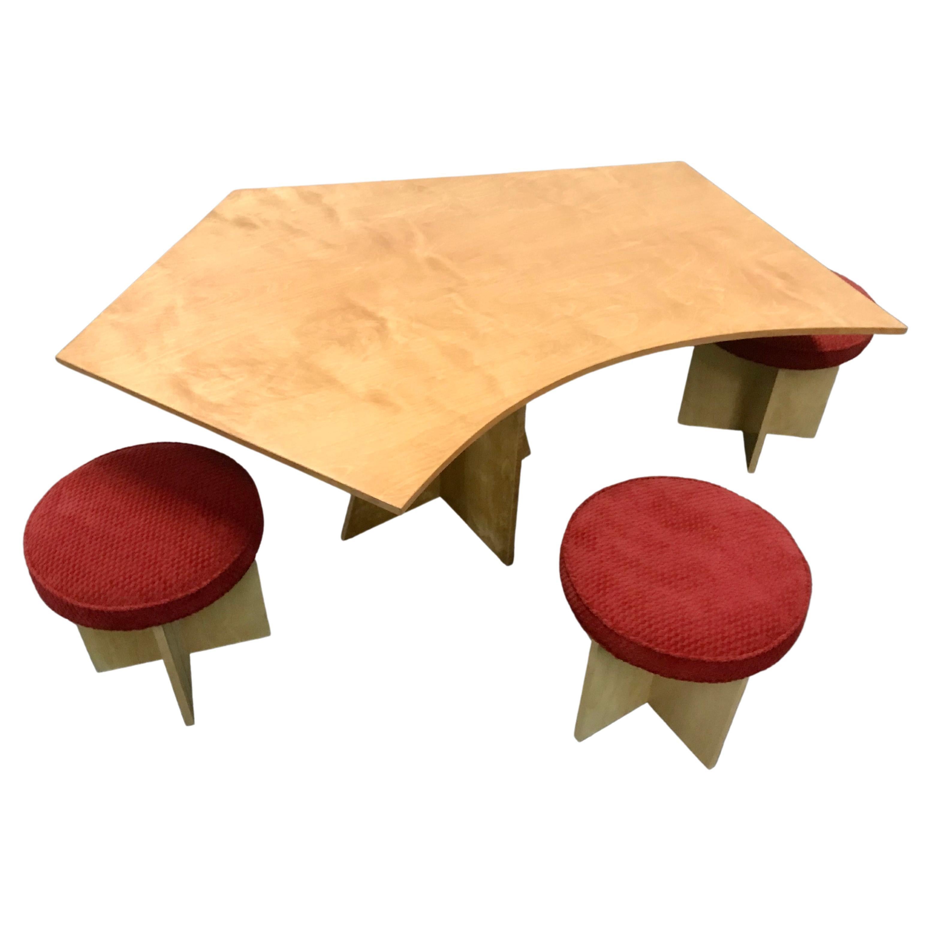Asymmetrical Top Table with Four Stools by Di Vincente