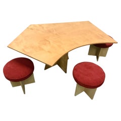 Asymmetrical Top Table with Four Stools by Di Vincente