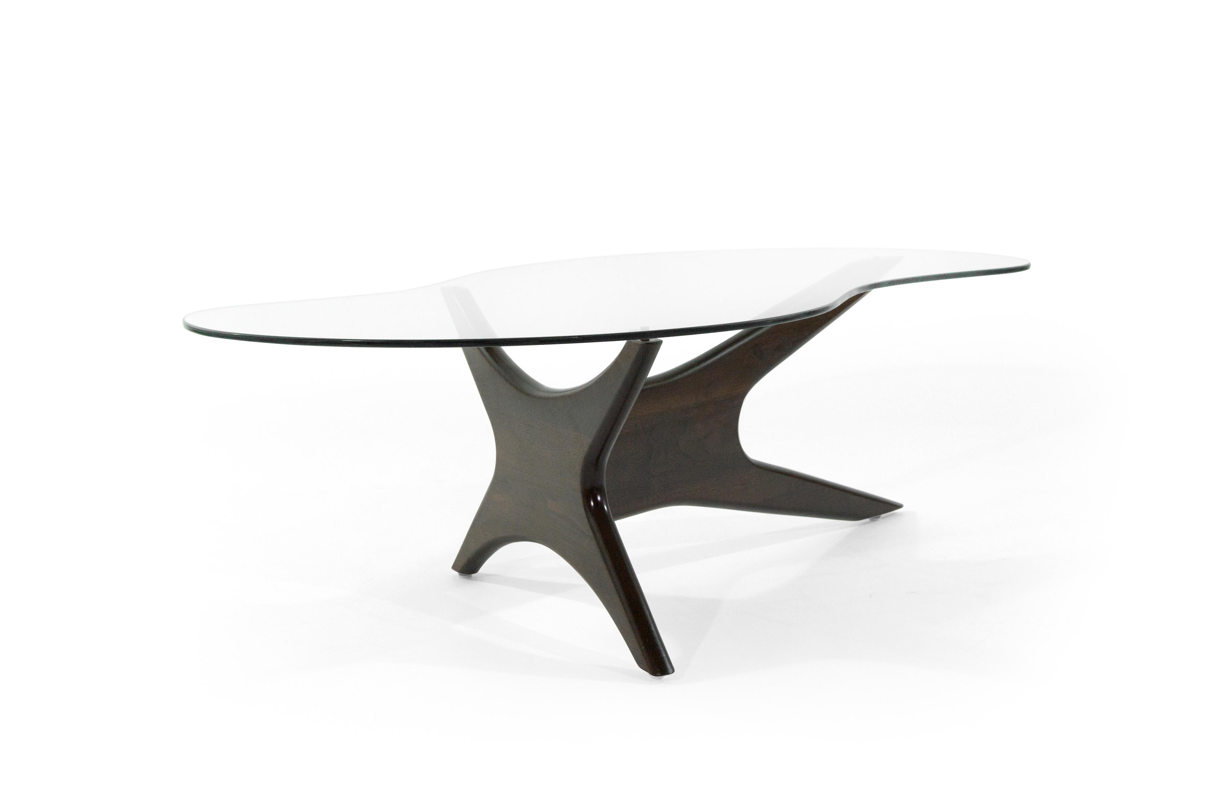 Biomorphic walnut and glass coffee table by Adrian Pearsall for Craft Associates, circa 1950s. 

Sculptural walnut base fully restored. New custom-made kidney shaped glass top.
 