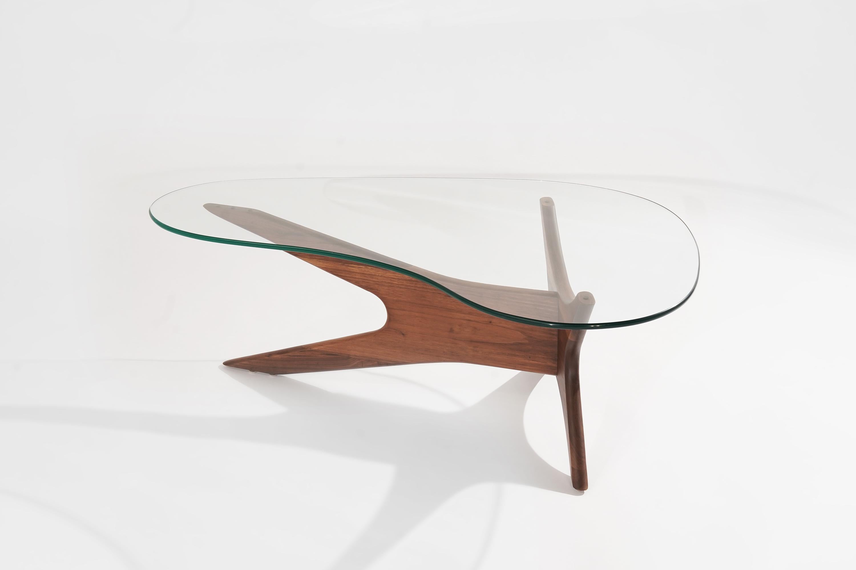 Biomorphic walnut and glass coffee table by Adrian Pearsall for Craft Associates, circa 1950s. 
Sculptural walnut base fully restored. New custom-made kidney-shaped glass top.

Other designers from this period include Ico Parisi, Vladimir Kagan,
